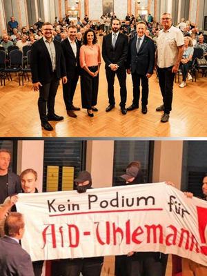 Teilnehmer der Diskussionsrunde (FF) und vermummte Störer (TUBAF)